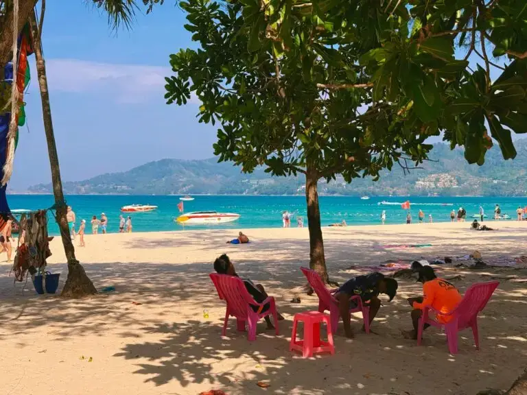 Relaxing beach scene with colorful chairs